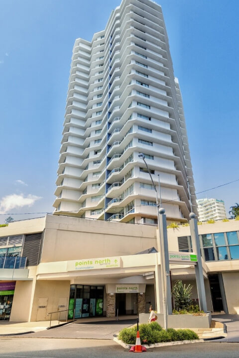 Exterior view of ULTIQA Points North building in Coolangatta, located above The Strand shopping centre.