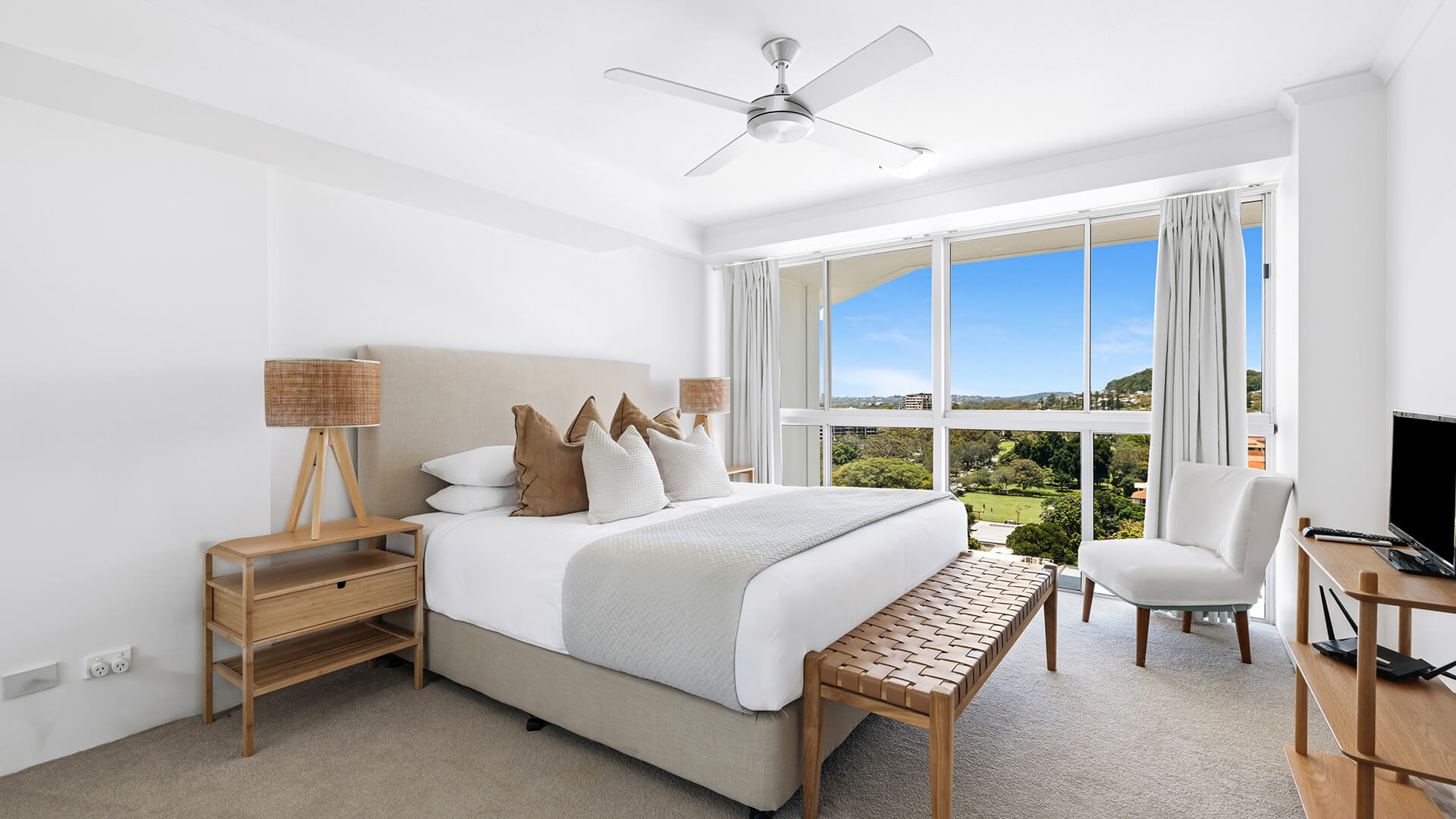 Bedroom in the 2 Bedroom Pool View Apartment at ULTIQA Points North with king bed, modern décor, and views over the pool and hinterland.