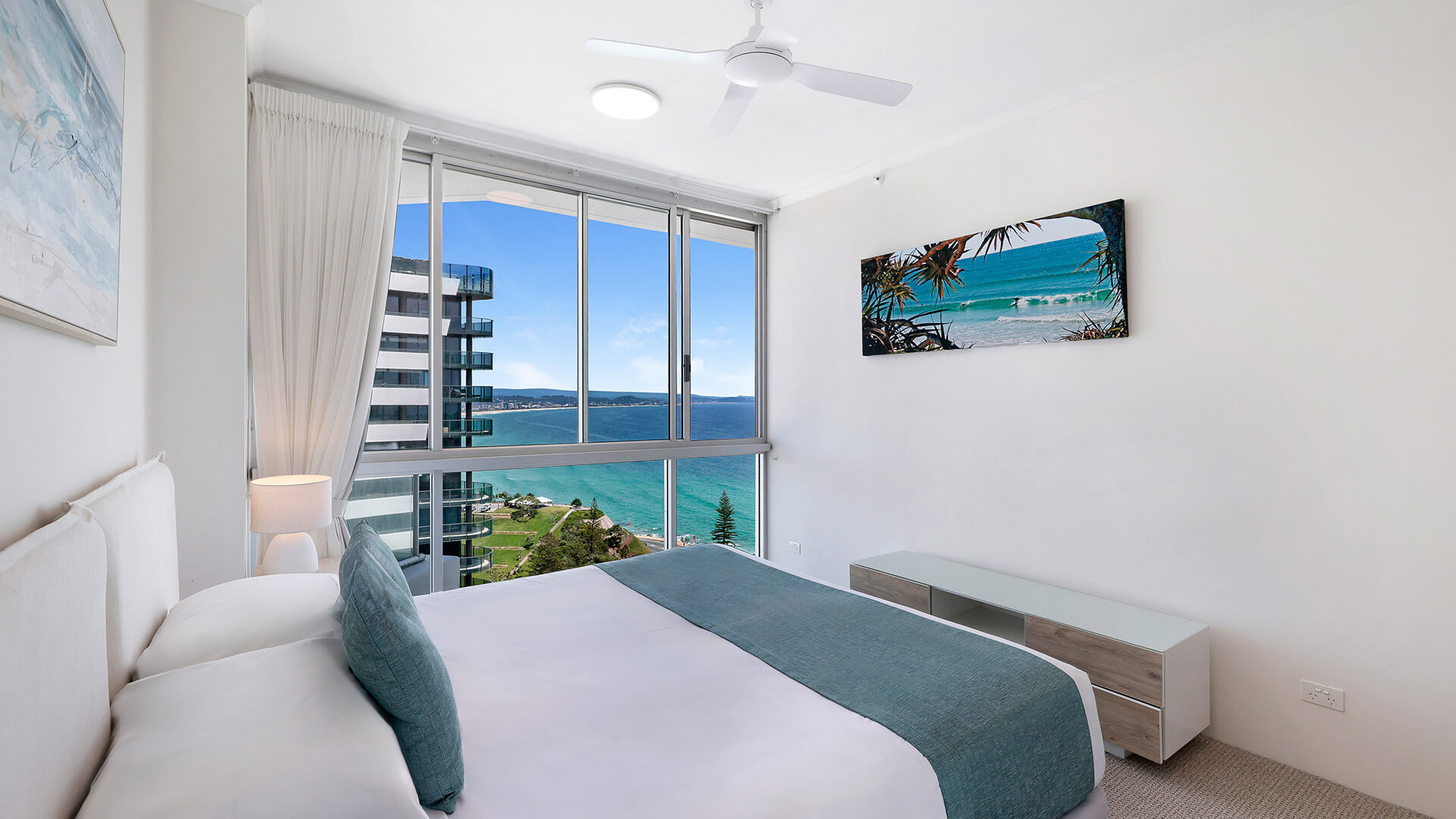 Bedroom in the 4 Bedroom Oceanfront Penthouse at ULTIQA Points North with ocean and coastline views.
