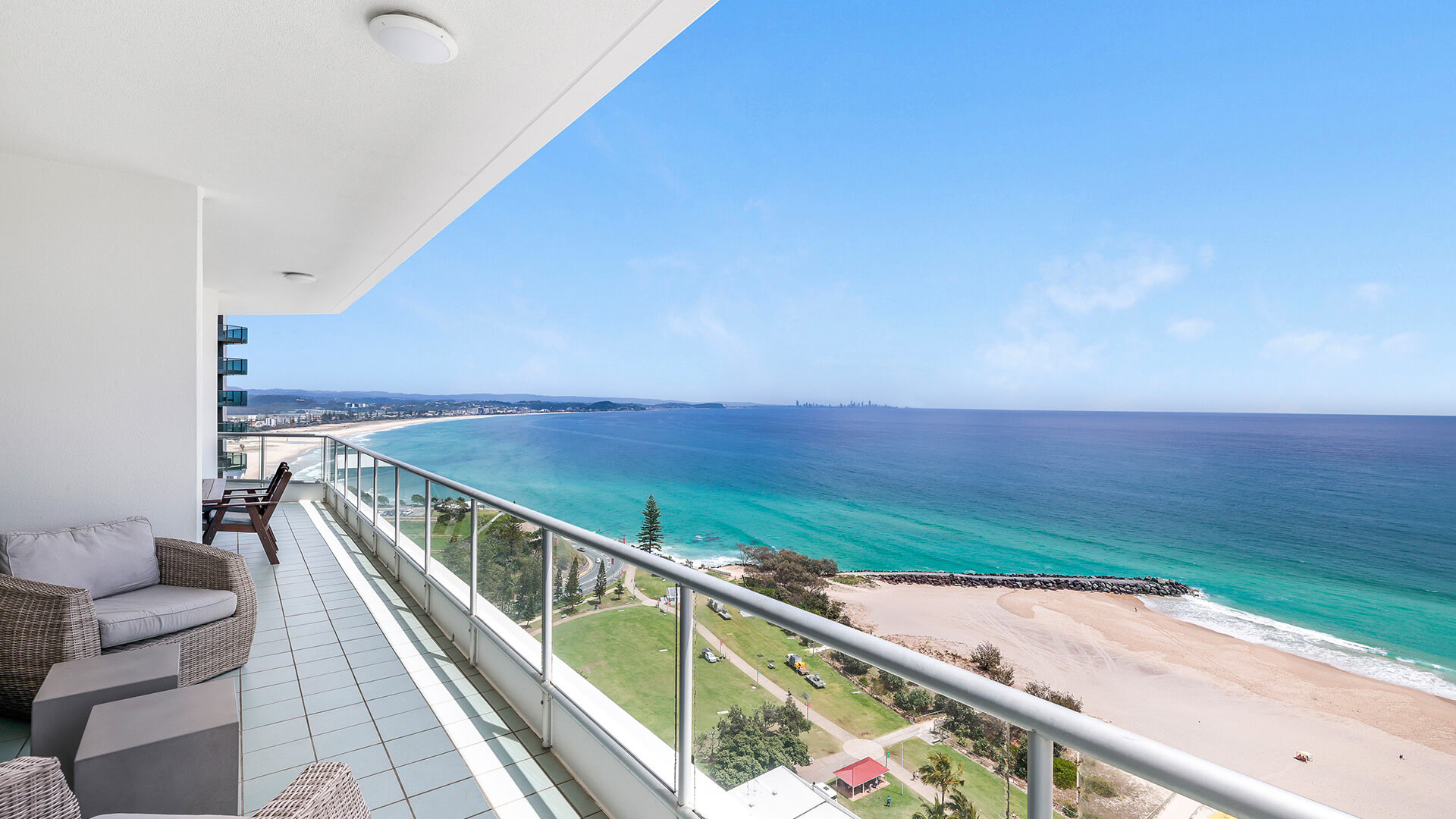 Balcony of the 4 Bedroom Oceanfront Penthouse at ULTIQA Points North overlooking the coastline and ocean.